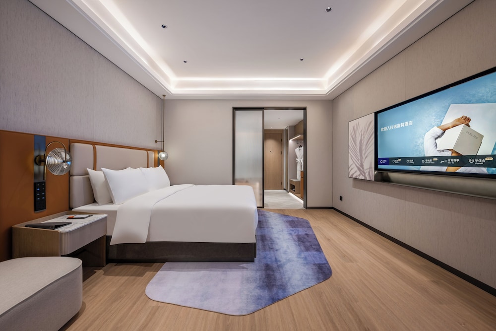 HABITACION EJECUTIVA con una Cama King Size del hotel Novotel Shanghai Hongqiao International Airport