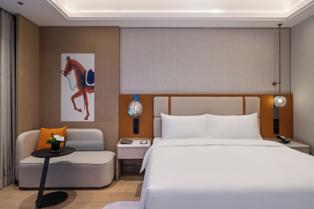 HABITACION EJECUTIVA con una Cama King Size del hotel Novotel Shanghai Hongqiao International Airport. Foto 2