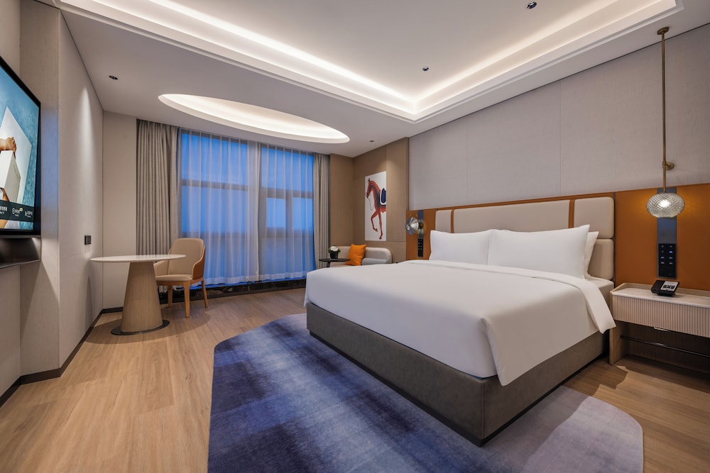 HABITACION EJECUTIVA con una Cama King Size del hotel Novotel Shanghai Hongqiao International Airport. Foto 3
