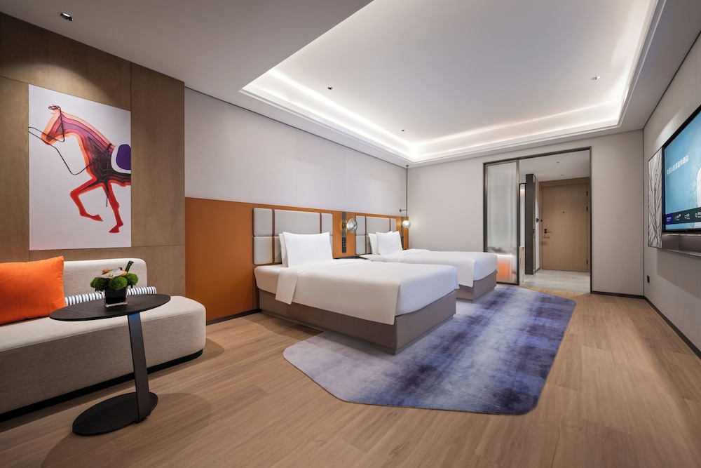 Habitación Ejecutiva con Dos Camas Individuales del hotel Novotel Shanghai Hongqiao International Airport. Foto 1