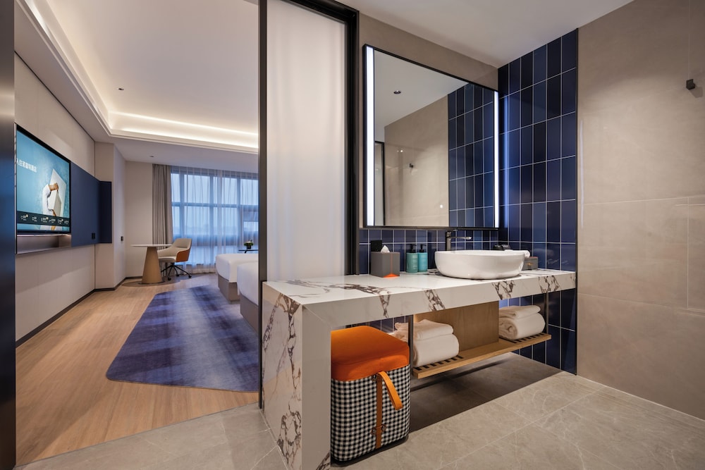 Habitación Ejecutiva con Dos Camas Individuales del hotel Novotel Shanghai Hongqiao International Airport. Foto 2