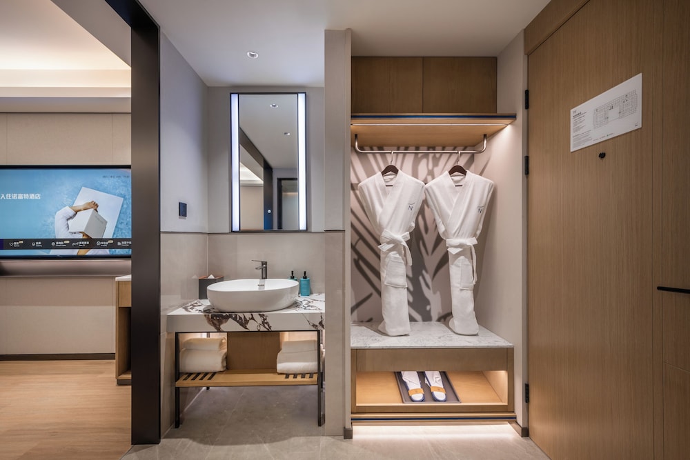 Habitación Ejecutiva con Dos Camas Individuales del hotel Novotel Shanghai Hongqiao International Airport. Foto 3