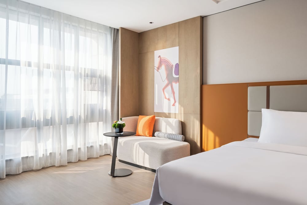 Habitación Ejecutiva con Dos Camas Individuales del hotel Novotel Shanghai Hongqiao International Airport. Foto 4