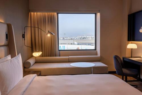 Habitación adaptada para personas con movilidad reducida - 1 cama grande - No fumadores del hotel Wyndham Grand Costa Del Sol Lima Airport. Foto 3