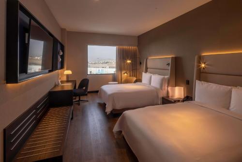 Habitación Superior con 2 camas individuales - No fumadores del hotel Wyndham Grand Costa Del Sol Lima Airport