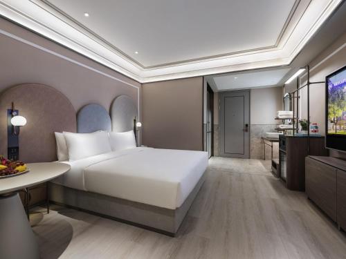 Habitación Deluxe con cama extragrande del hotel Mercure Shanghai Qiantan