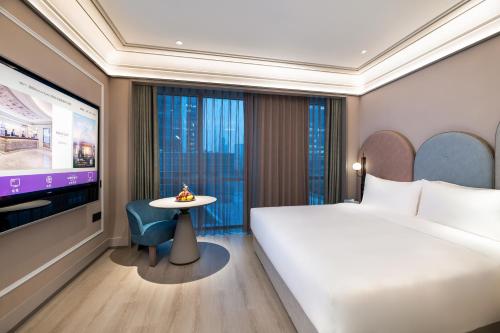 Habitación Estándar - Cama extragrande del hotel Mercure Shanghai Qiantan