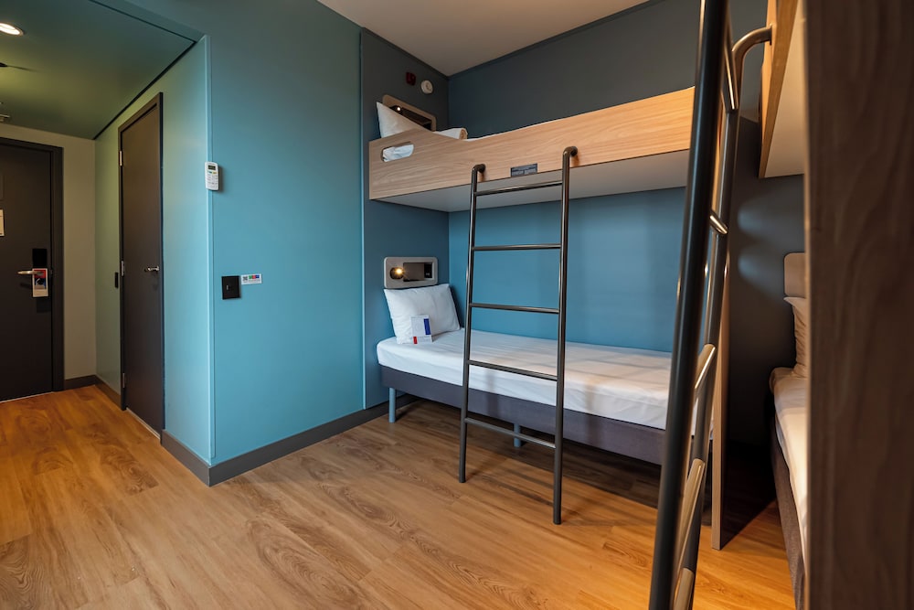 Habitación estándar con 2 literas del hotel ibis budget Guarulhos Aeroporto. Foto 6