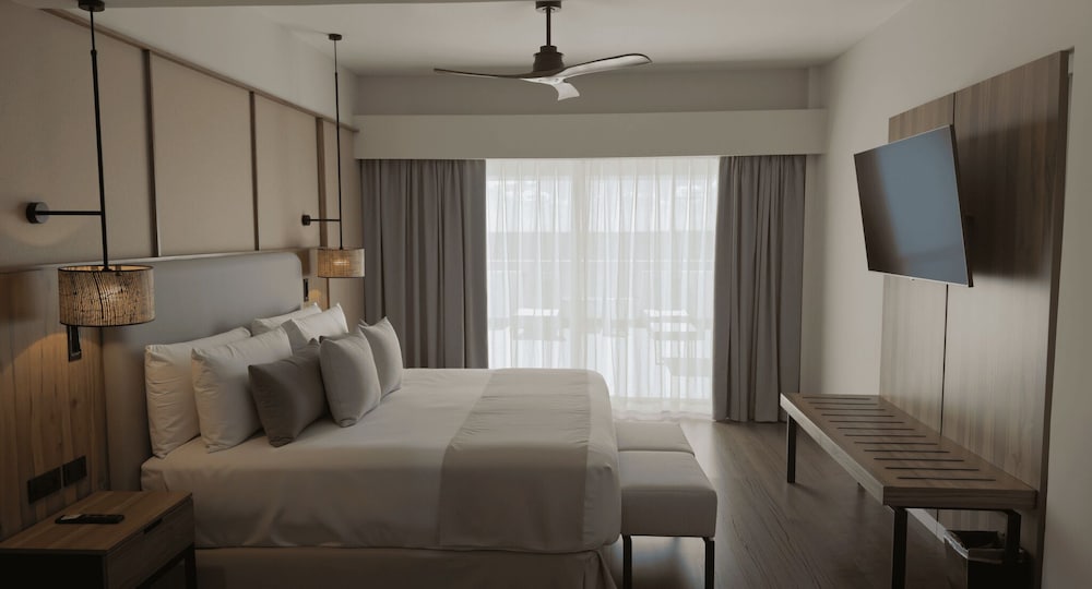 Habitación Signature, 1 cama de matrimonio grande, balcón, vistas al mar del hotel Santo Domingo Bay Convention Resort and Casino
