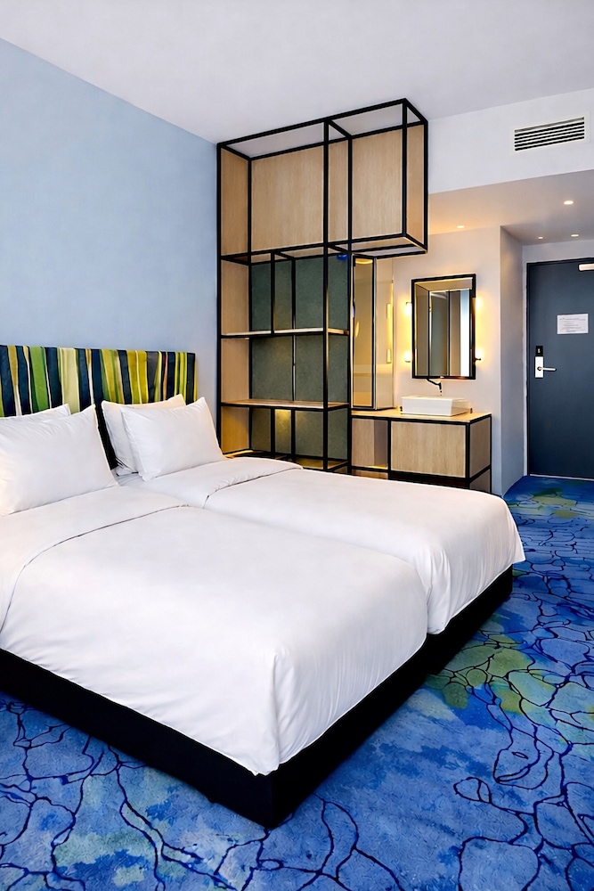 Habitación Standard doble con 2 camas individuales del hotel Ibis Styles Muenchen Airport