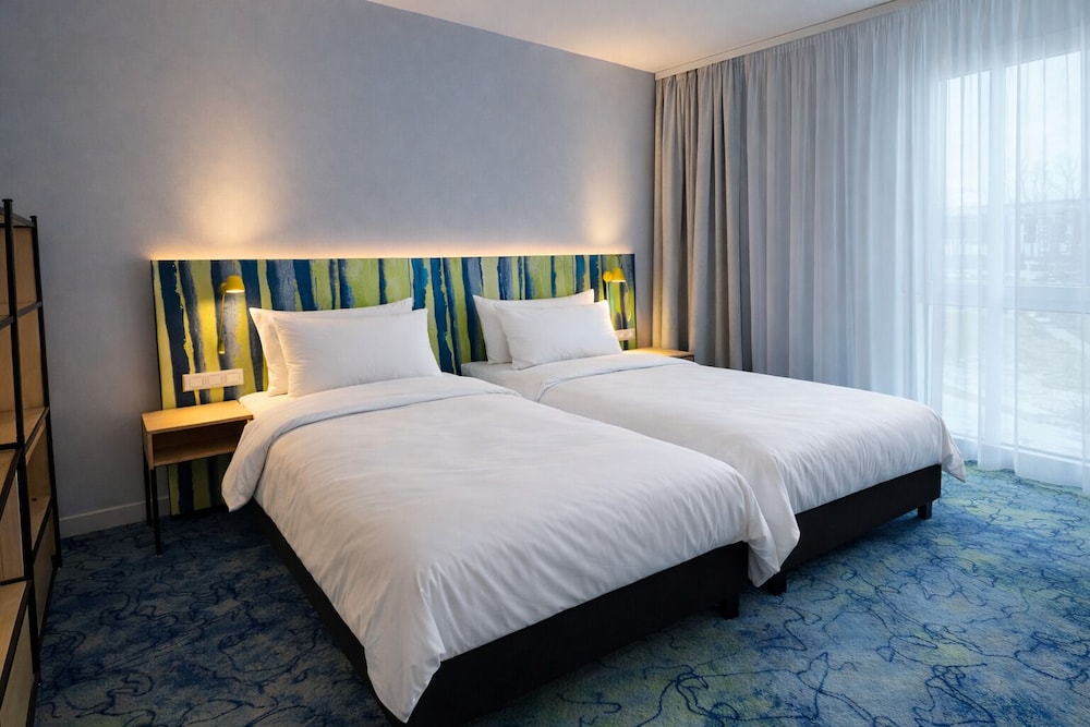Habitación Standard doble con 2 camas individuales del hotel Ibis Styles Muenchen Airport. Foto 2
