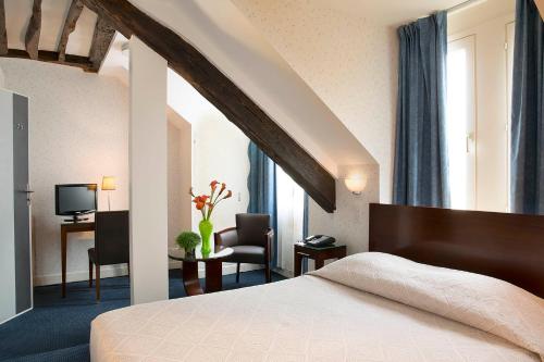 Habitación Doble Económica del hotel HOTEL DU PRINTEMPS. Foto 1