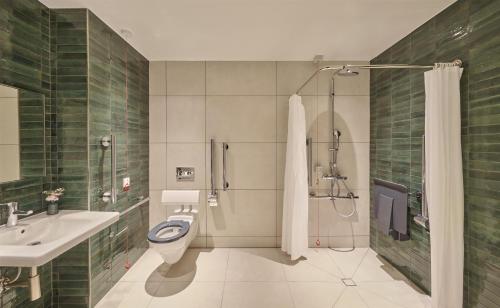 Habitación Twin Deluxe adaptada para personas con movilidad reducida - 2 camas del hotel Hyatt Regency London Olympia