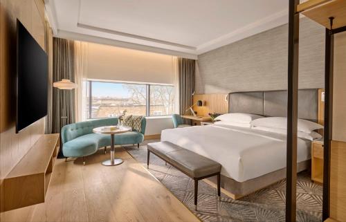 Habitación Deluxe con cama extragrande del hotel Hyatt Regency London Olympia