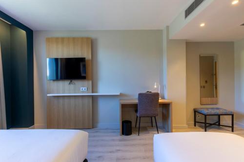 Habitación Triple del hotel Travelodge Bilbao Sestao. Foto 16