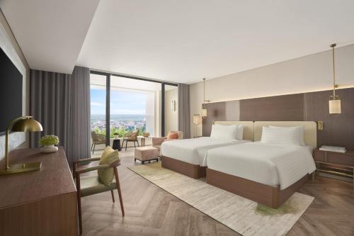 Deluxe Twin Room with Corner Mountain View del hotel Pullman Ninh Binh. Foto 9