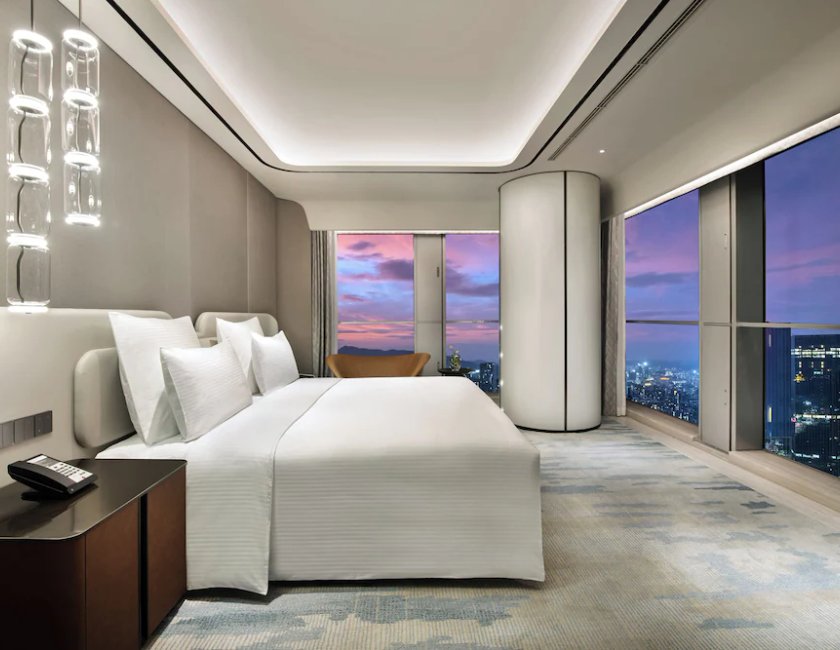 SUITE DELUXE, Acceso al Salón, 1 Cama King Size, Vistas al Horizonte del hotel Pullman Shenzhen North. Foto 3