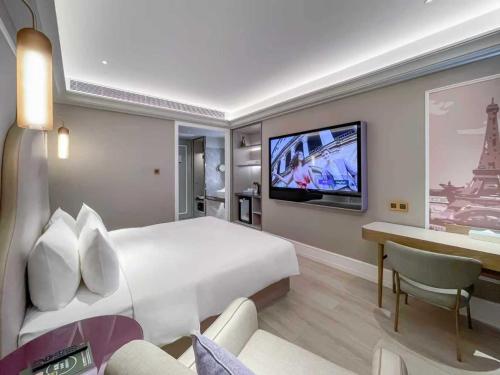 Habitación Estándar - Cama extragrande del hotel Mercure Beijing Zhongguancun. Foto 4