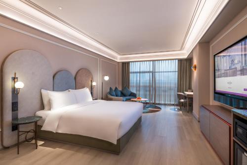 Habitación Privilege con cama extragrande del hotel Mercure Beijing Zhongguancun. Foto 1