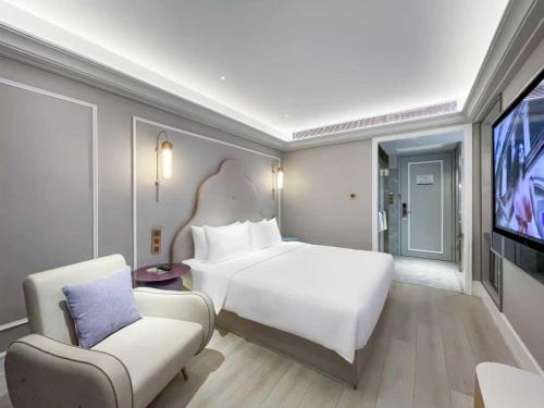 Habitación Privilege con cama extragrande del hotel Mercure Beijing Zhongguancun. Foto 3