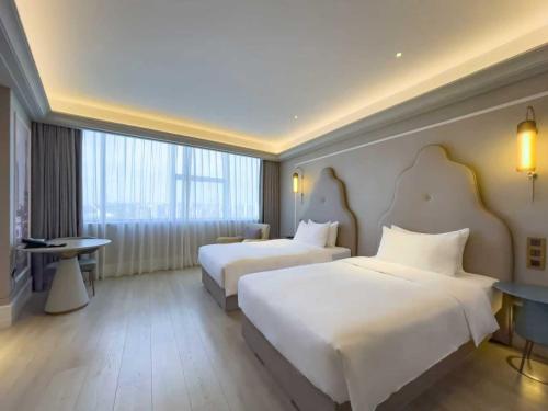 Habitación Doble Deluxe - 2 camas del hotel Mercure Beijing Zhongguancun. Foto 3