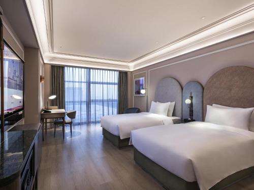 Habitación Doble Deluxe - 2 camas del hotel Mercure Beijing Zhongguancun. Foto 5