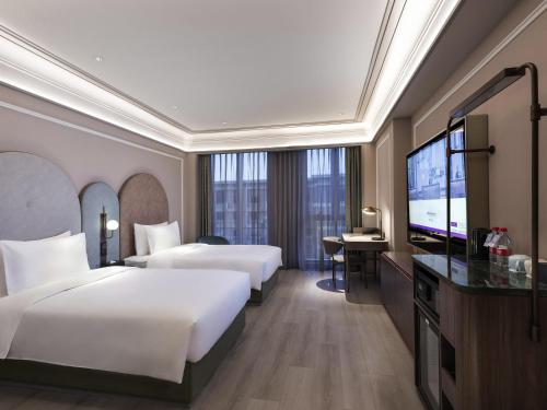 Habitación Doble Superior - 2 camas del hotel Mercure Beijing Zhongguancun. Foto 7