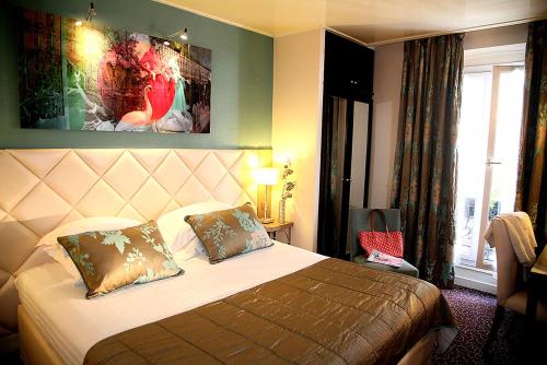 Superior Queen Room with Bath Tub - Non - Smoking del hotel Best Western Anjou Lafayette Opera. Foto 1