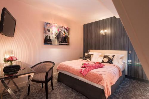 Superior Queen Room with Bath Tub - Non - Smoking del hotel Best Western Anjou Lafayette Opera. Foto 4