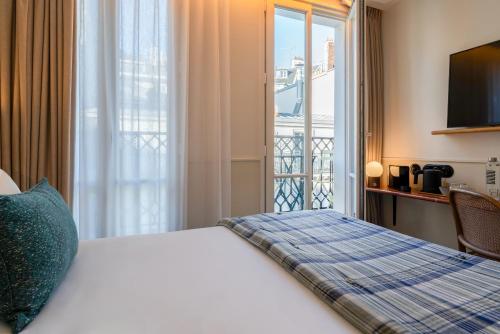 Very Bonne Chambre with Balcony del hotel Dadou Paris. Foto 6