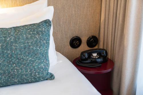 Very Bonne Chambre with Balcony del hotel Dadou Paris. Foto 9