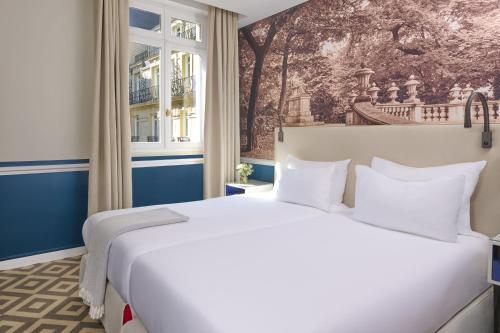 Suite Deluxe de 1 dormitorio con vistas al patio del hotel Fraser Suites Le Claridge Champs-Elysées. Foto 5