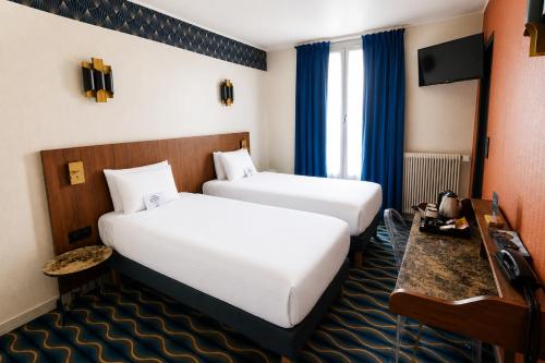 Habitación Twin (2 camas individuales) del hotel Kyriad Paris 13 - Italie Gobelins