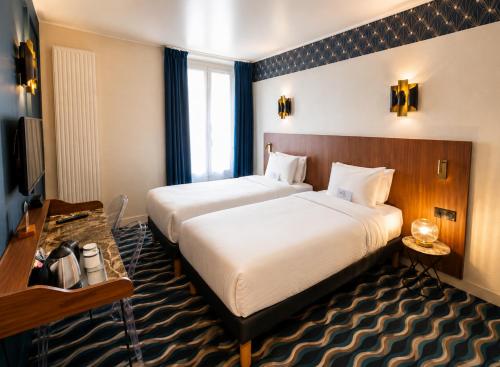 Habitación Twin (2 camas individuales) del hotel Kyriad Paris 13 - Italie Gobelins. Foto 2