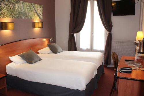 2 Habitaciones Dobles comunicadas del hotel Kyriad Paris 13 - Italie Gobelins. Foto 2