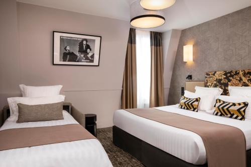 Habitación Triple del hotel Daunou Opera. Foto 1
