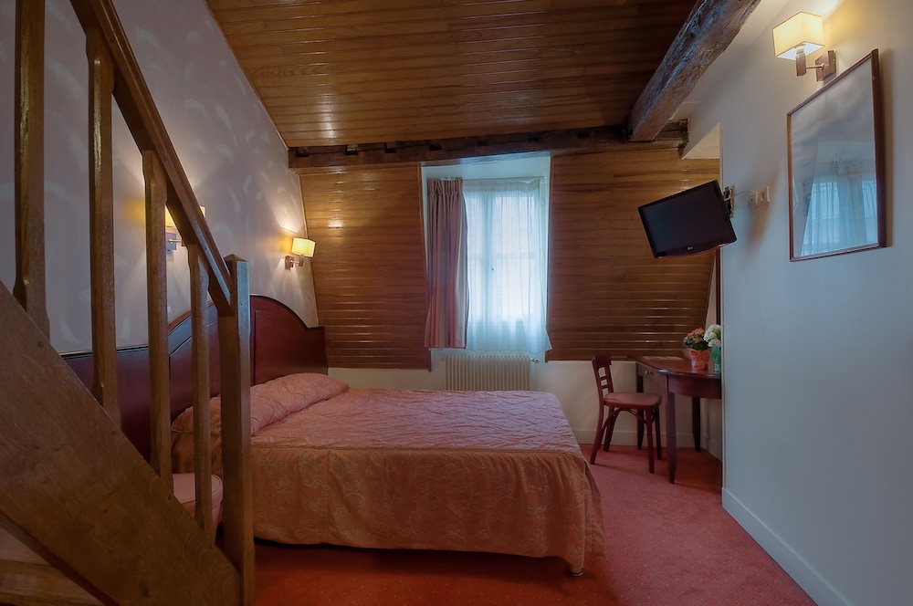Habitación Triple del hotel Le Faubourg. Foto 1