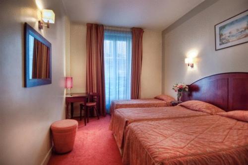Habitación Triple del hotel Le Faubourg