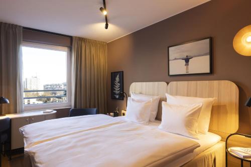 Habitación Doble Estándar - 2 camas del hotel Scandic Stuttgart Europaviertel. Foto 2