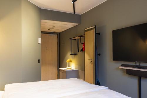 Habitación Doble Estándar - 2 camas del hotel Scandic Stuttgart Europaviertel. Foto 3
