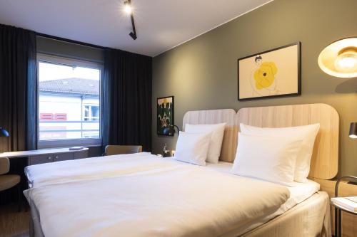 Habitación Doble Estándar - 2 camas del hotel Scandic Stuttgart Europaviertel. Foto 4