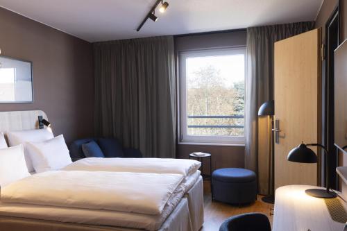Standard Family Three del hotel Scandic Stuttgart Europaviertel. Foto 3