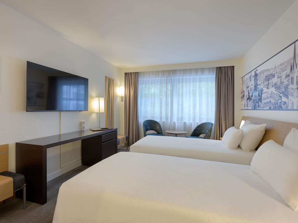 Habitación estándar con camas individuales del hotel Novotel Aachen City. Foto 5