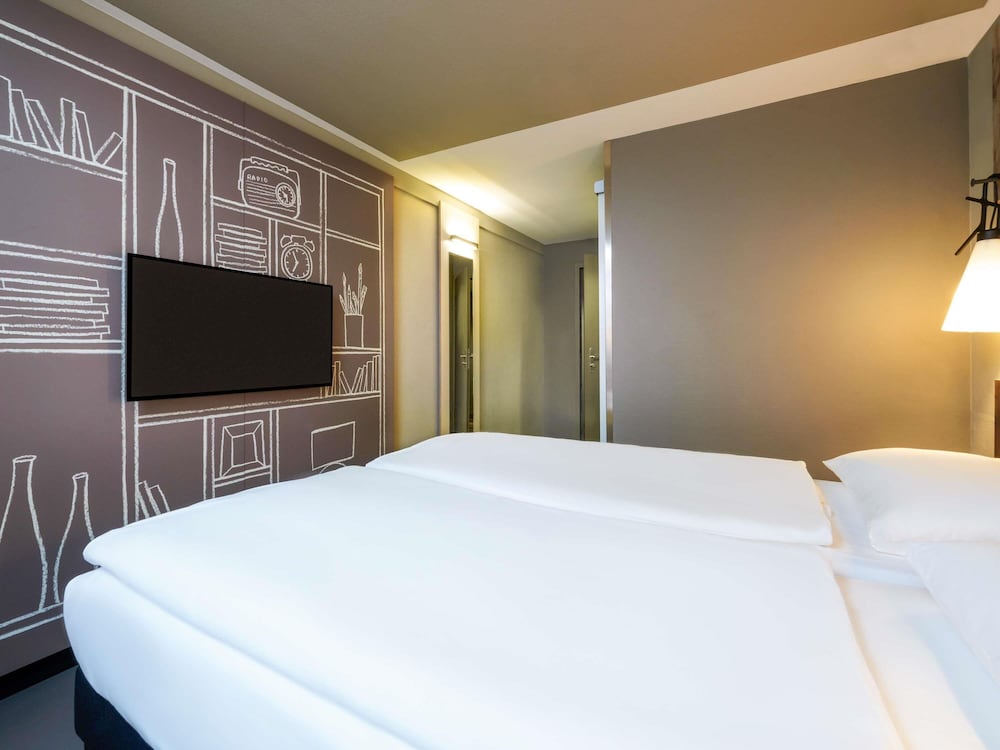 Habitación Standard con dos camas individuales del hotel Ibis Zurich Adliswil. Foto 1