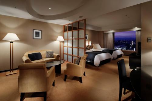 Suite Junior con 2 camas individuales del hotel Granvia Kyoto. Foto 8