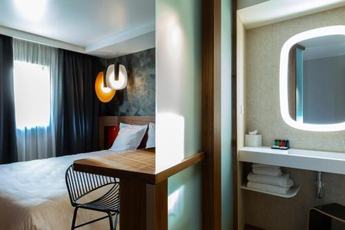 Habitación Doble Deluxe del hotel Oceania Paris Porte De Versailles