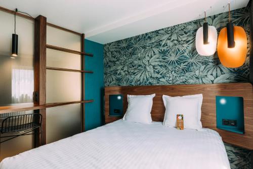 Habitación Doble Deluxe del hotel Oceania Paris Porte De Versailles. Foto 2