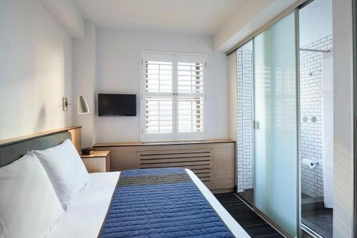 Habitación Pod - Cama doble grande del hotel Pod 51. Foto 1