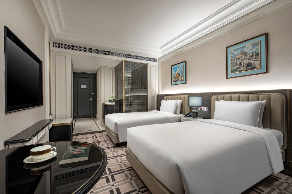 Habitación superior, 2 camas individuales del hotel Pullman Beijing South. Foto 1