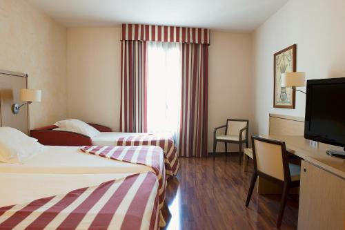 Habitación Triple del hotel Duran and Restaurant. Foto 2